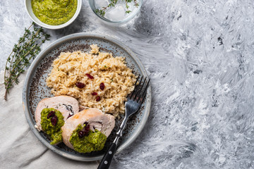 Sliced Chicken Roll with Cranberries, Pesto and Rice.