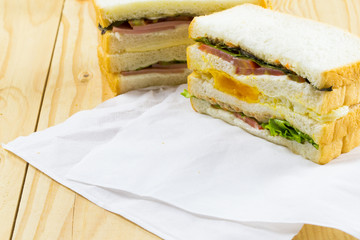 Poached eggs sandwich for breakfast on table