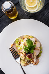 Grilled chicken breast salad with figs, green apple, celery, nuts and Parmesan.