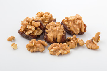 Fototapeta premium Walnuts with dates, healthy snack