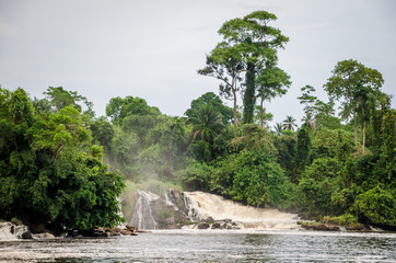 Naklejka premium Famous Lobe Falls at Kribi, Cameroon, one of the few waterfalls in the world to fall into the sea.