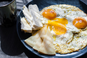 fried eggs with cheese
