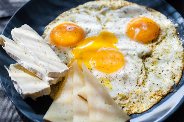 fried eggs with cheese