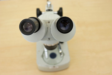 Binocular microscope on table