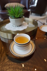 cup of tea with teapot and cup of tea