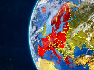Schengen Area members from space on model of planet Earth with country borders and very detailed planet surface and clouds.