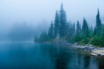 mountain lake with fog