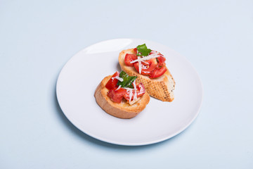 Homemade Italian Bruschetta Appetizer, snack on bread 
