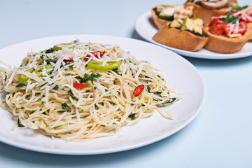 Pasta with vegetables, Whole wheat fusilli pasta with grilled vegetables. Top view with copy space.