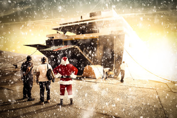 Santa Claus with few people. Winter photo with snow 