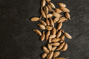 Cardamom pods in a dark background 