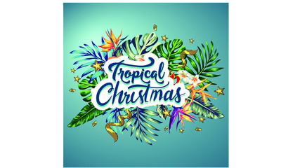 Fototapeta na wymiar Christmas decorations in tropical style of palm leaves and tropical flowers decorations for the new year