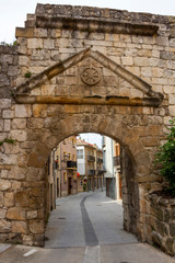 Fototapeta na wymiar View through the old Gate of Castile, Puerta de Castilla in the town of Estella or Lizzara, Navarre Spain