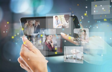 Woman holding   digital tablet on background