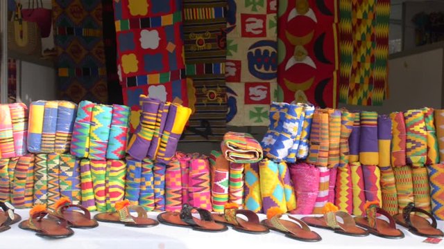 Beautiful Handwoven Kente fabric on display in a market in Ghana.