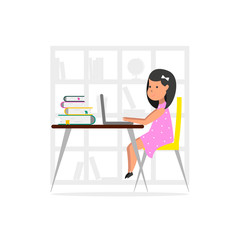 Fototapeta premium Small girl at home using a laptop computer.