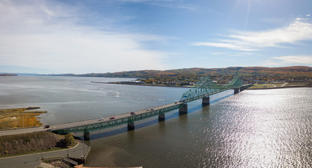 Aerial panoramic view of J.C. Van Horne Bridge that runs from Pointe-à-la-Croix, Quebec, to Campbellton, New Brunswick, Canada.