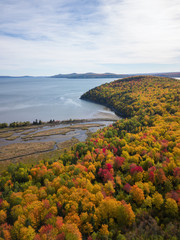 Aerial view of a beautiful Canadian Landscape during fall color season. Taken near Pointe-à-la-Croix, Quebec, Canada.