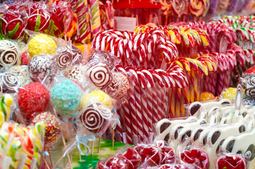 Fototapeta na wymiar christmas peppermint candies on the street fair