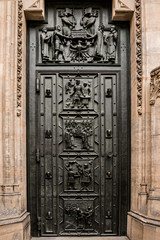 West facade of the Cathedral of Saints Vitus built in the 14th century. Front door with decor, Prague, Czech Republic. Travel photography