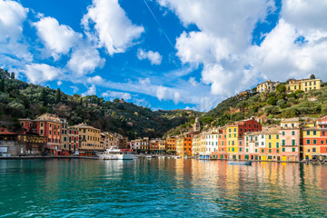 City view of Portofino in Liguria with a harbour and boat from the sea