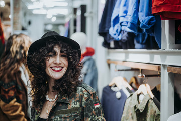 Woman buying clothes at the fashion store