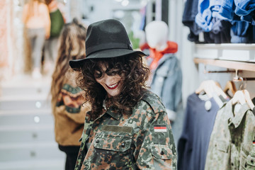 Woman buying clothes at the fashion store