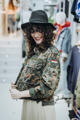 Woman buying clothes at the fashion store