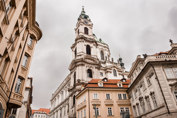 Fototapeta na wymiar The Church of Saint Nicholas is a Baroque church in the Lesser Town of Prague. Travel photography