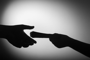 dark economy. Two hands with money