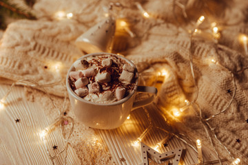 Obraz na płótnie Canvas Hot chocolate with melted marshmallow Christmas Background Holiday Candy cane Warming Winter Drink Toned image Vintage style