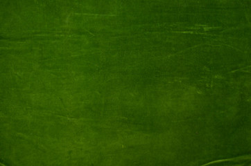 Detailed abstracted light green background, old velvet material.