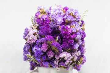 beautiful lilac flowers in metal bucket isolated on white