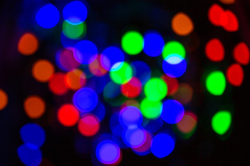 Beautiful festive round colorful, dark light blurred background for design Light bokeh overlay