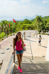 young woman walking on the beach