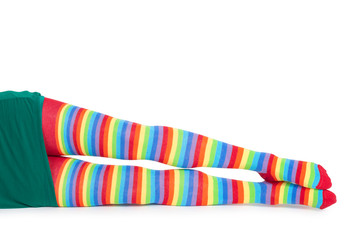 Perfect long female legs in rainbow pantyhoose
