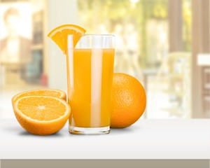 Orange juice and slices of orange on background © BillionPhotos.com
