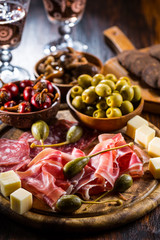 Serrano ham platter with variation of appetizers