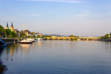 Beautiful view over river moselle towards the Balduinbrücke (Baldwin Bridge) at dawn, Koblenz, Germany