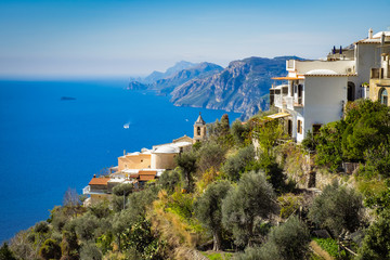 Beautiful colorful view of clill side village homes and sea of the Amalfi coast.