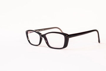 Eyeglasses for improving vision, correcting farsightedness on a white background