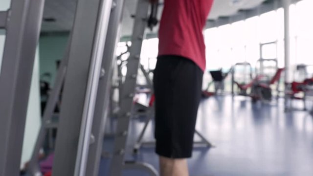 Sporty Man Training With Barbell in the Gym. Sporty Man Doing Deadlift Exercise. Sports and Fitness Concept, Strength Training for Building Muscles