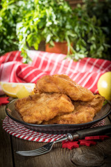 Fried cod slices in breadcrumbs.