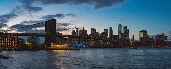 Fototapeta na wymiar A view of New York City / Manhattan from Dumbo park at evening, USA