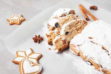 Christmas stollen on grey table.