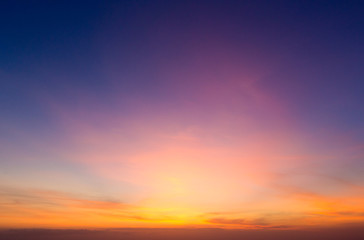 Colorful sunset sky over tranquil sea surface