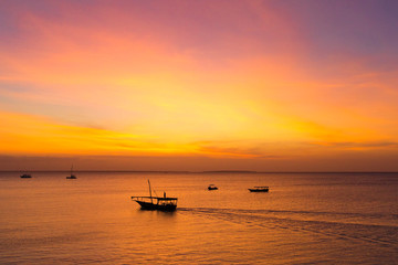 Naklejka na ściany i meble Sunset on sea in Zanzibar