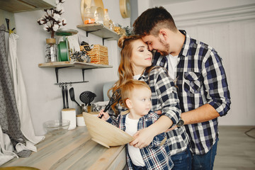Cute family have fun in the kitchen