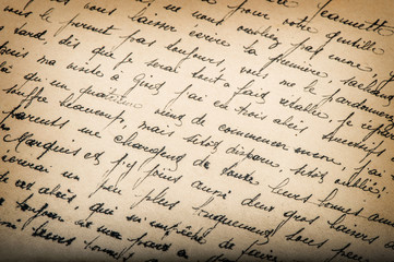 Old unreadable handwritten text aged paper texture background