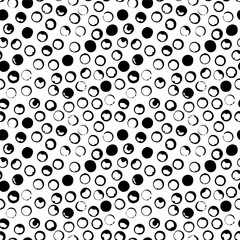 Vector seamless polka dot pattern. Hand drawn vector ornament for wrapping paper.	 